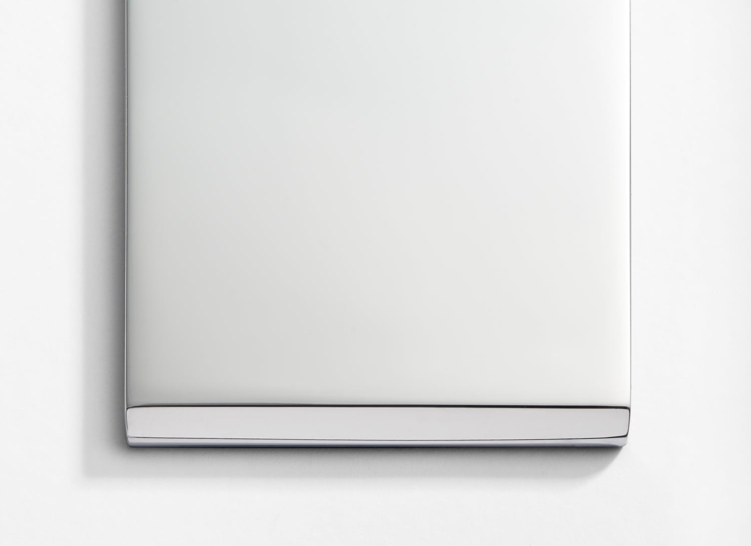 A white box on a white surface.