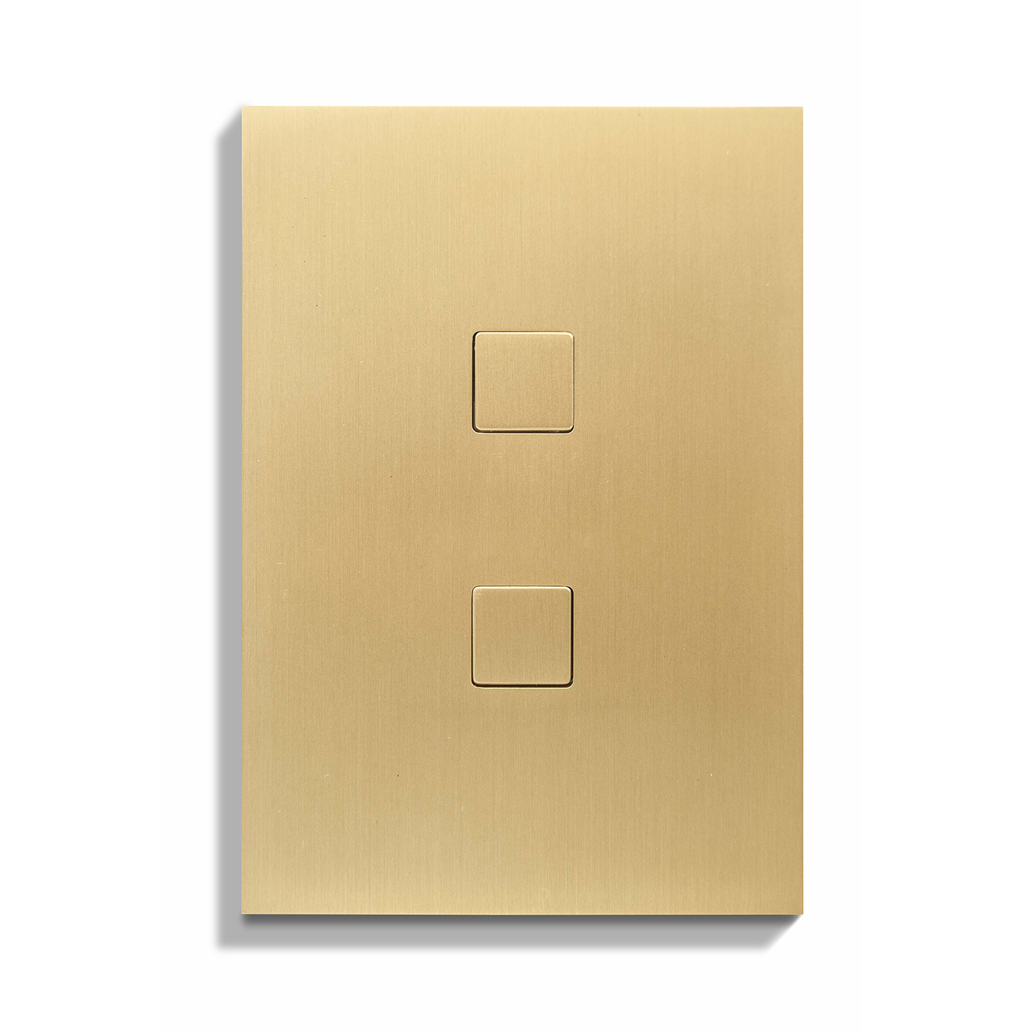A brass switch plate with two squares on it.