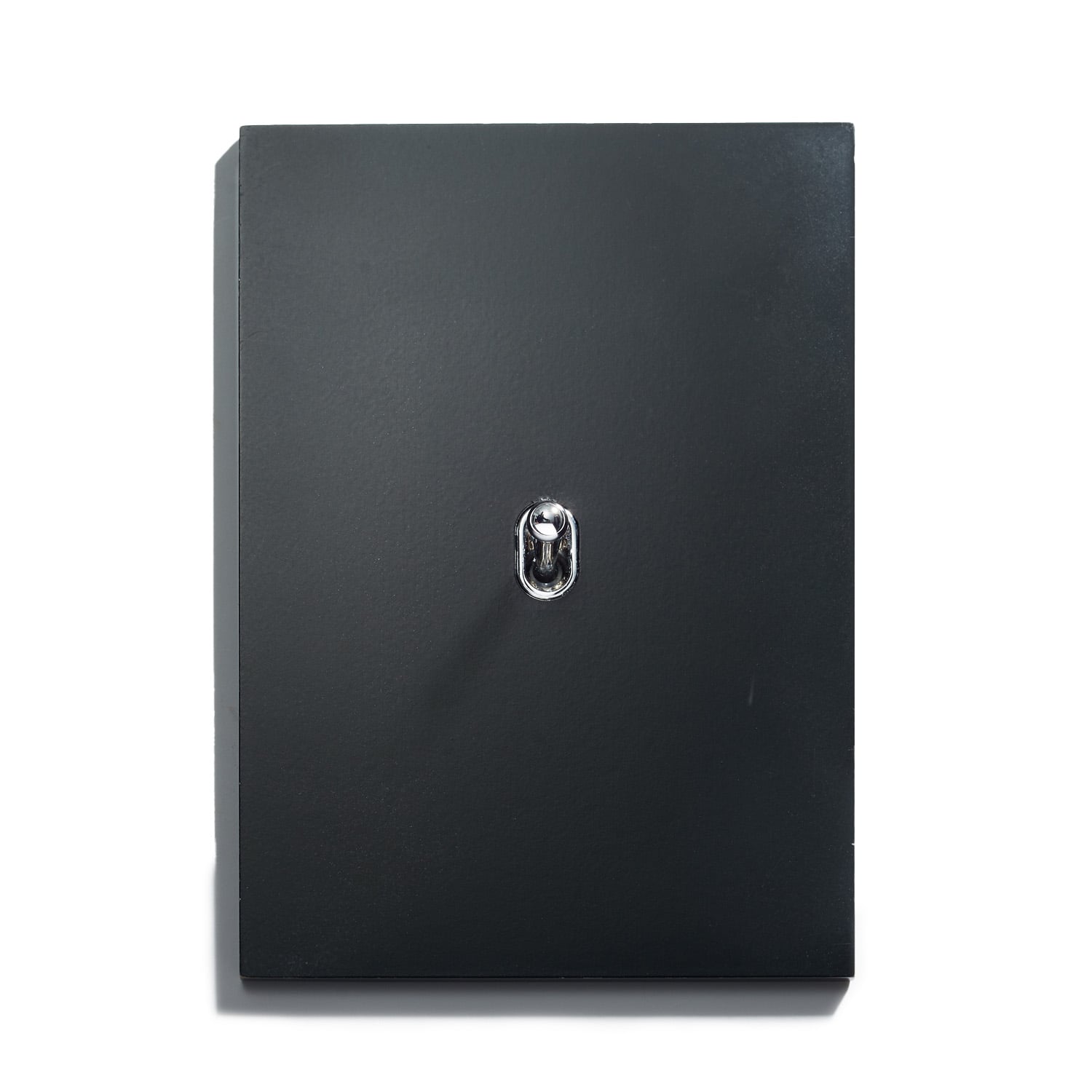 A black box with a metal handle on it.