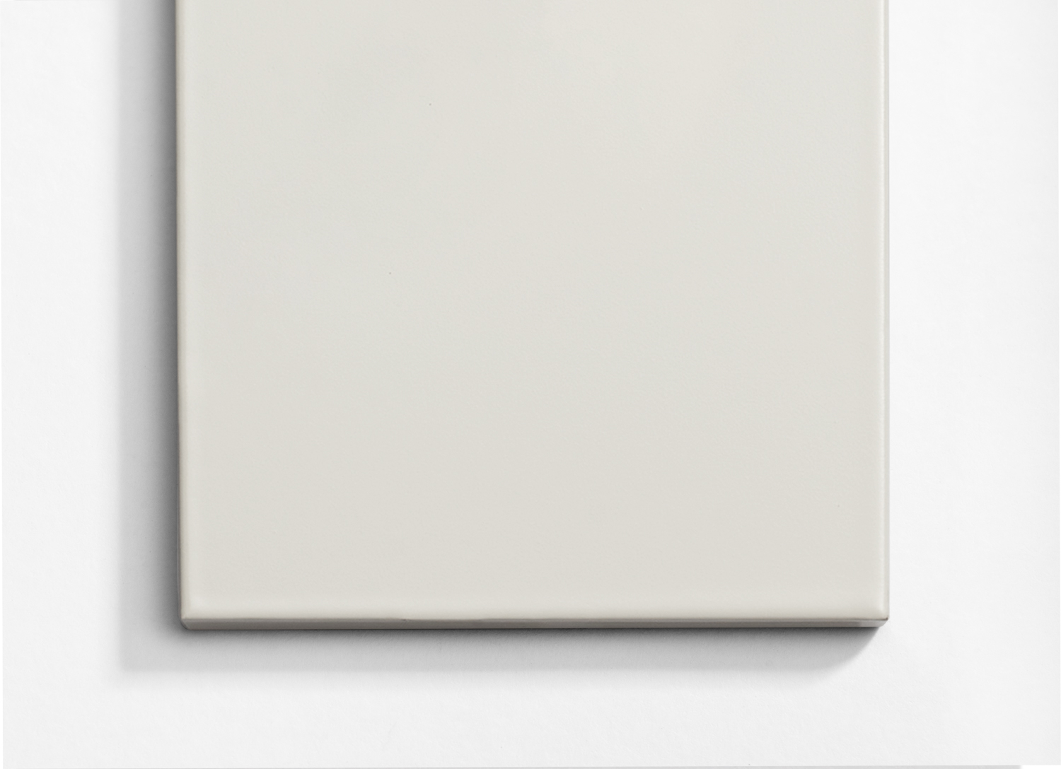 A white square on a white wall.