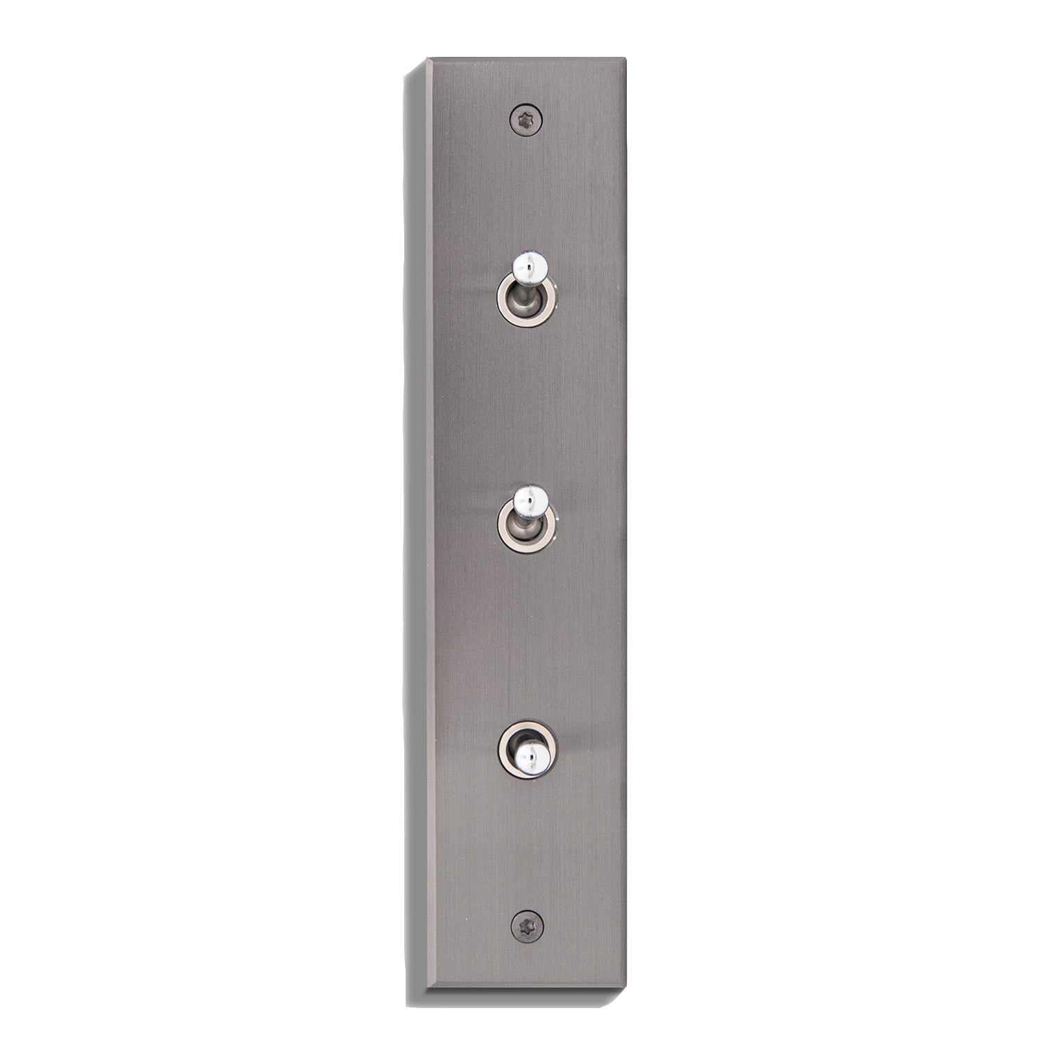 A metal wall plate with three buttons on it.