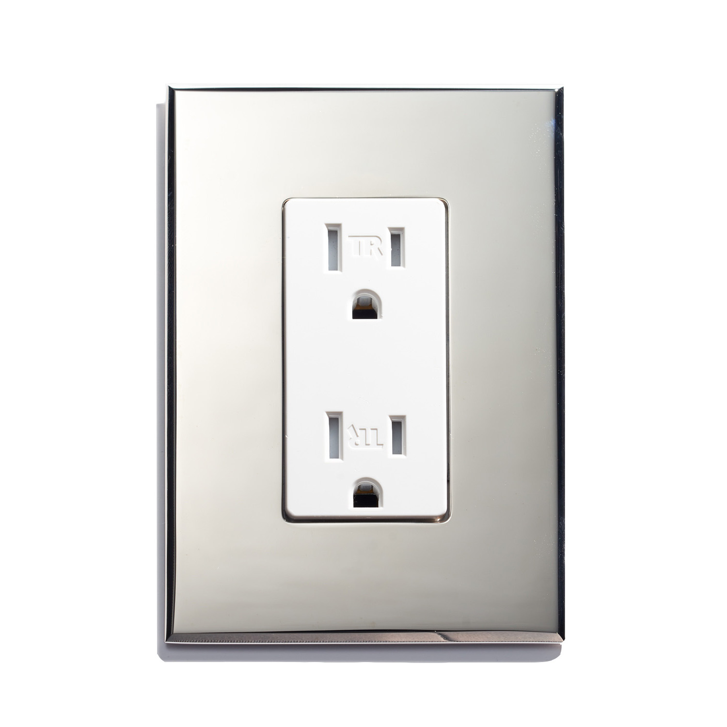 A white wall plate with two outlets on it.