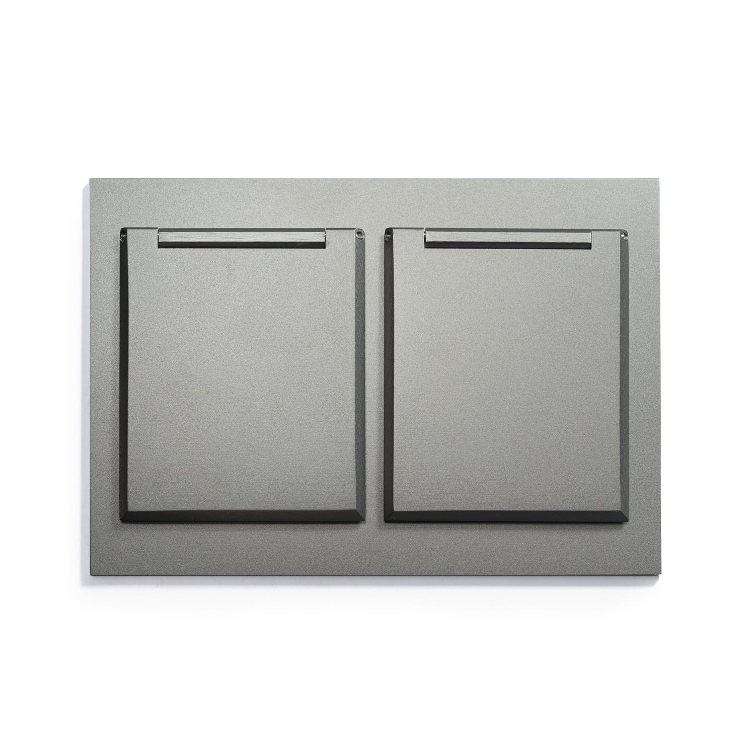 A grey wall plate with two drawers on it.