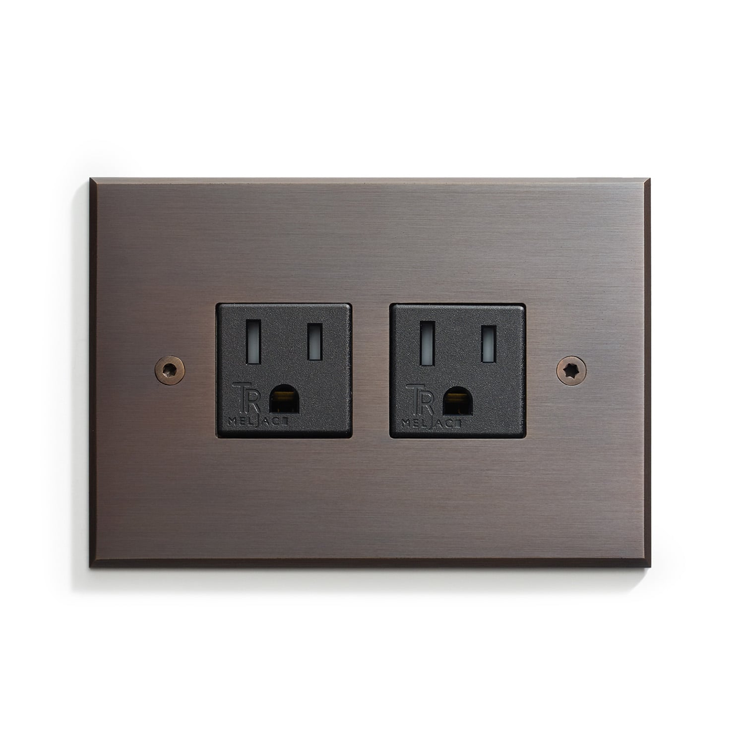 A brown wall plate with two outlets on it.