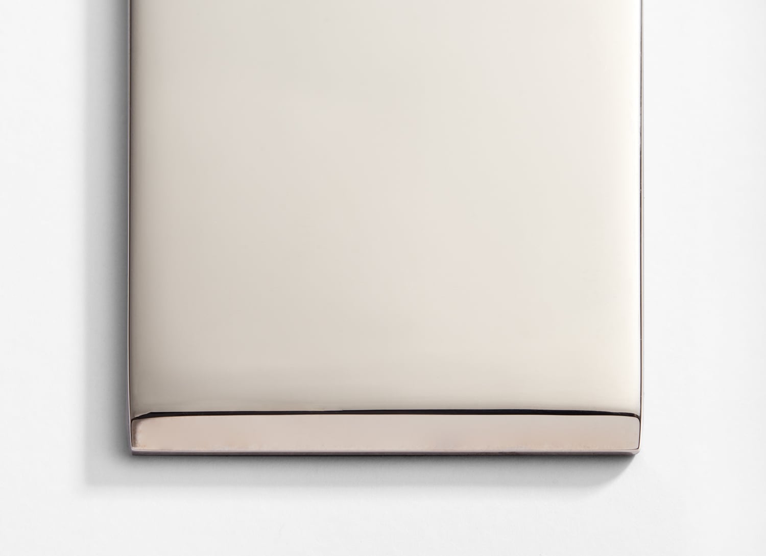 A close up of a silver plate.