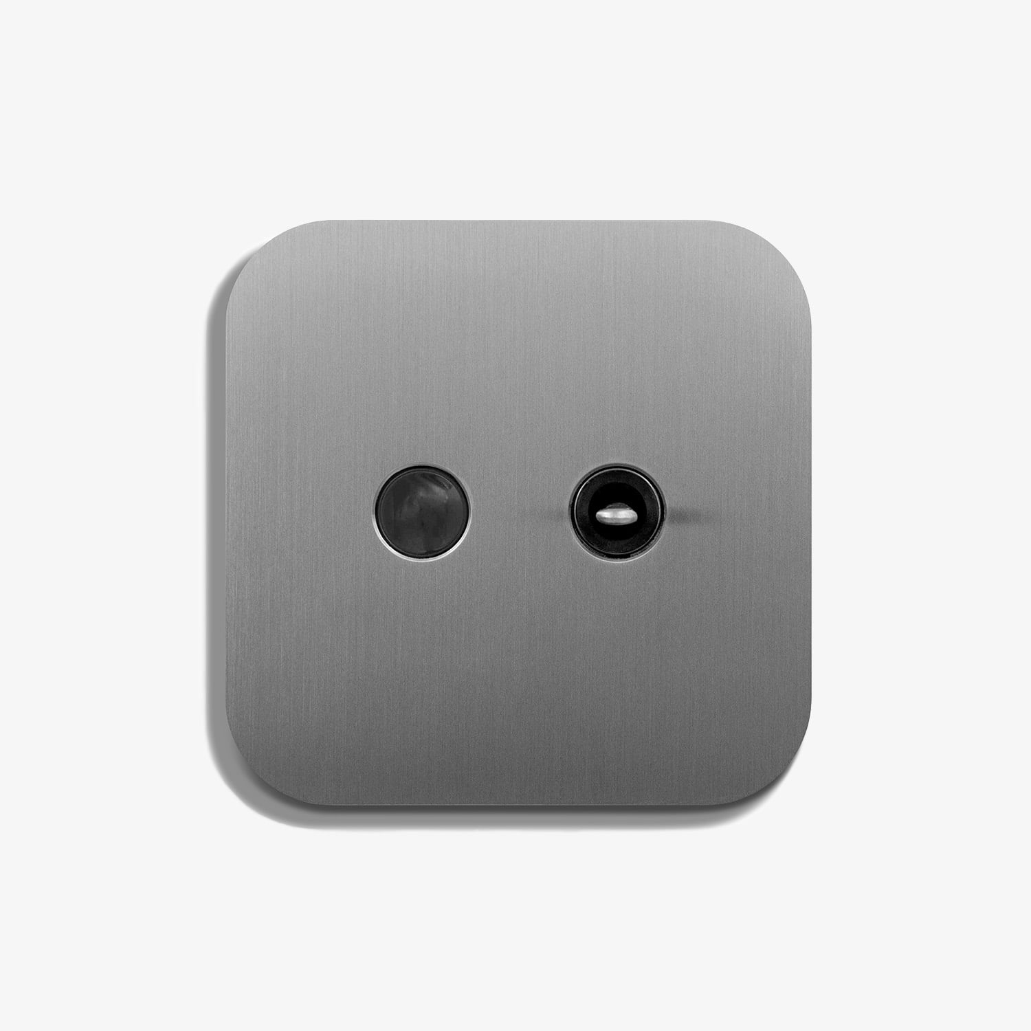 A metal switch with two buttons on it.