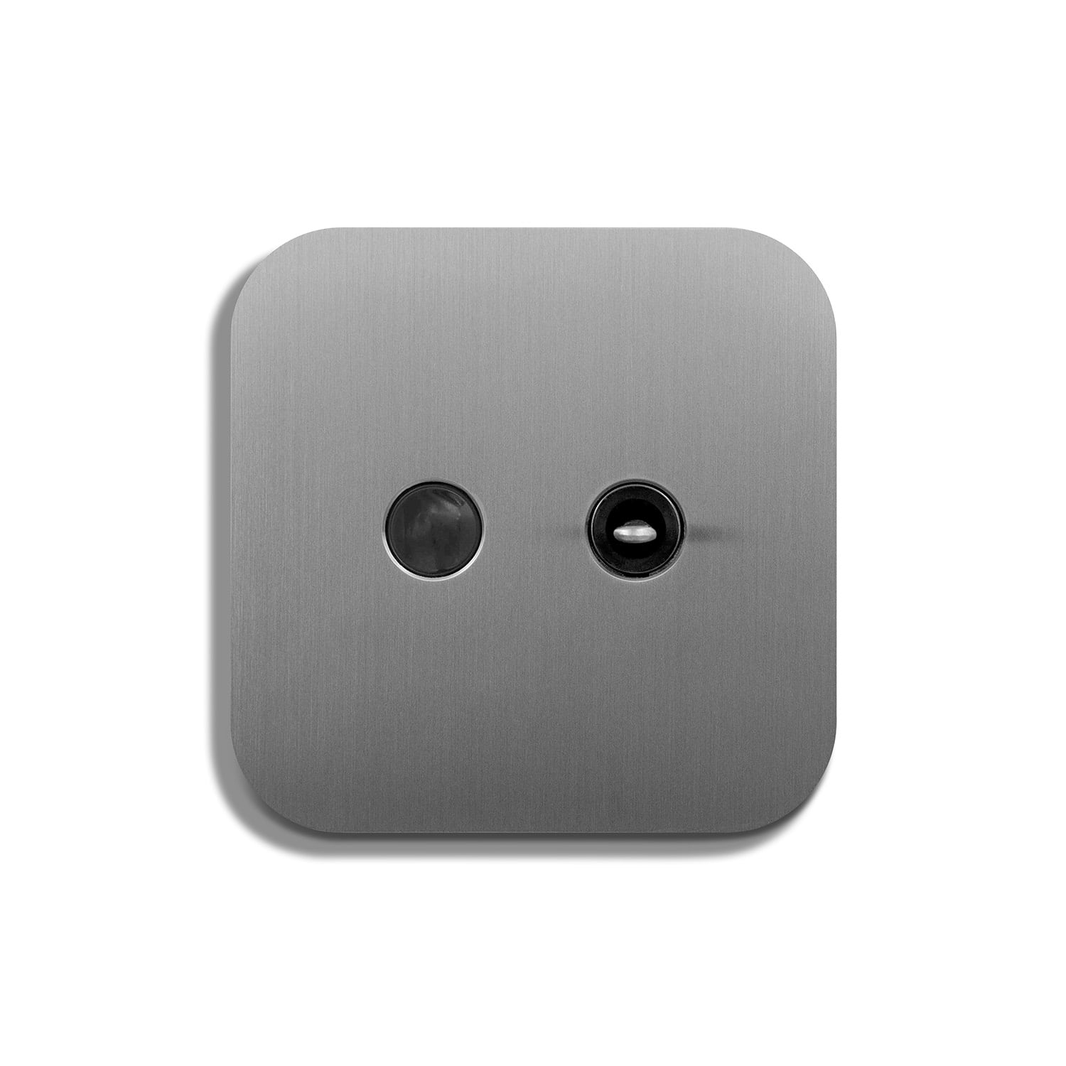 A light switch with two buttons on a white surface.