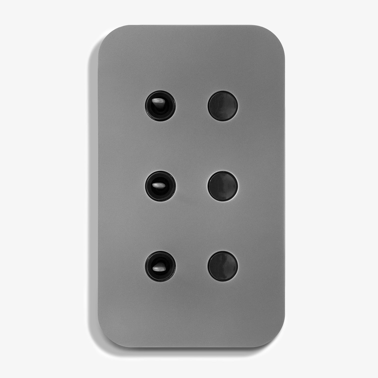 A grey wall plate with four buttons on it.