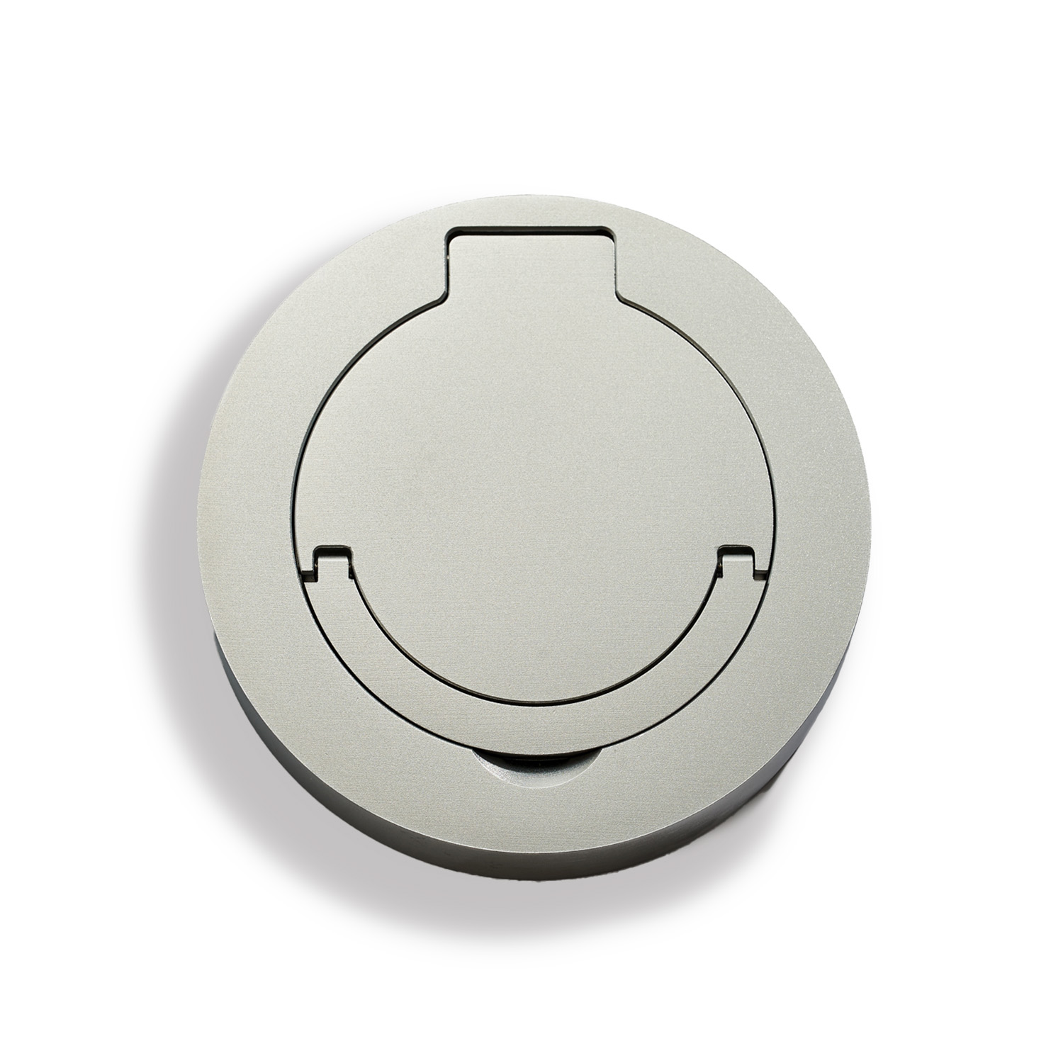 Round metallic cover with a recessed grip design, photographed on a clean white background.