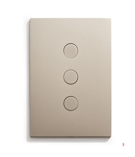 A light switch with four buttons on a white surface.